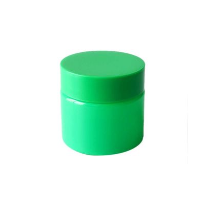 frasco plástico da erva daninha do verde 3oz com o tampão resistente da criança